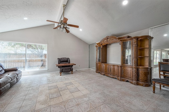 7635 Loro Linda Dr, Houston, TX 77083 - living area featuring baseboards, recessed lighting, ceiling fan, vaulted ceiling, and a textured ceiling
