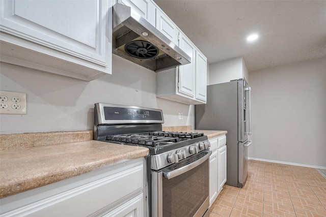 7635 Loro Linda Dr, Houston, TX 77083 - kitchen with recessed lighting, stainless steel appliances, exhaust hood, white cabinets, and light countertops