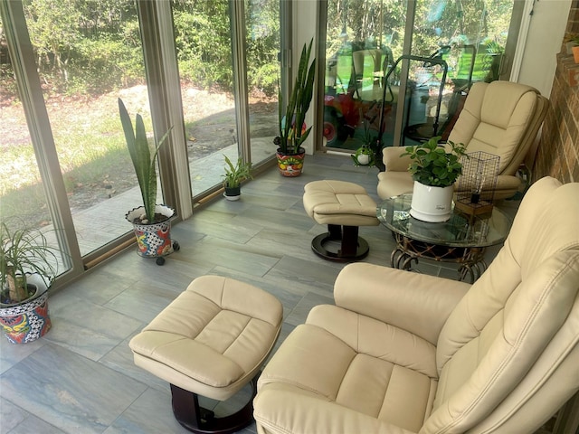 sunroom / solarium featuring plenty of natural light