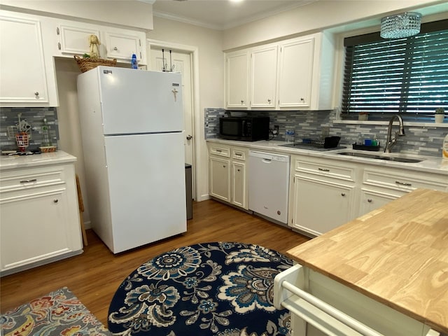 kitchen featuring white cabinetry, white appliances, and sink