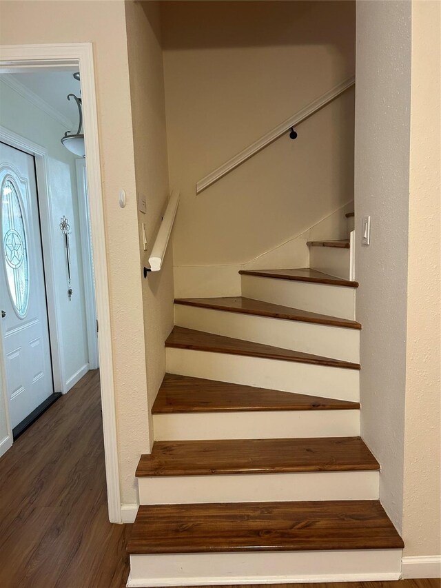 36 Corkwood Rd, Trinity, TX 75862 - stairs featuring wood finished floors and ornamental molding