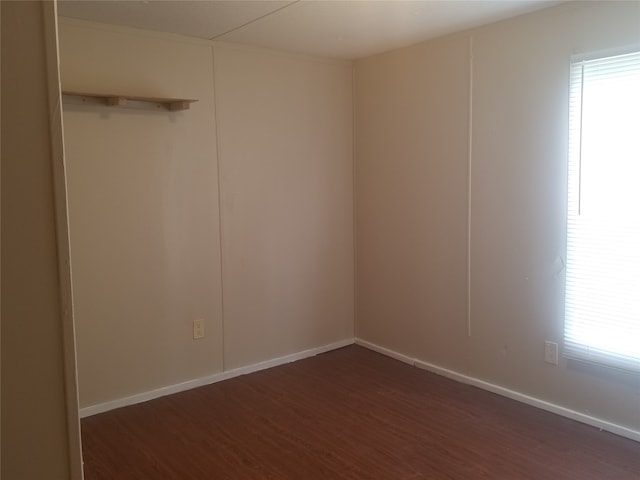 spare room featuring hardwood / wood-style flooring