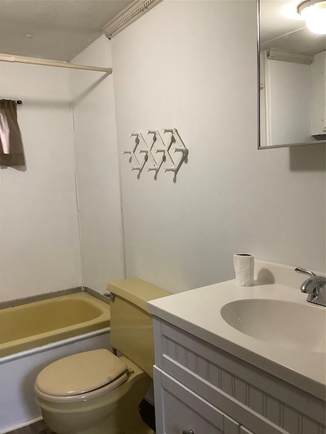 full bathroom with bathing tub / shower combination, toilet, and vanity