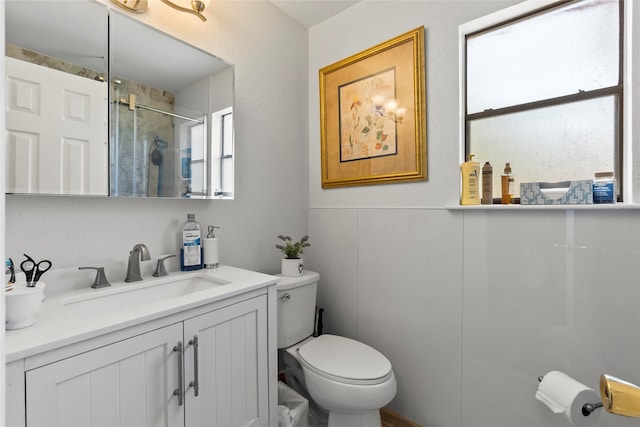 bathroom featuring toilet and oversized vanity