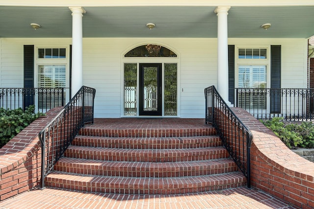 doorway to property with a porch