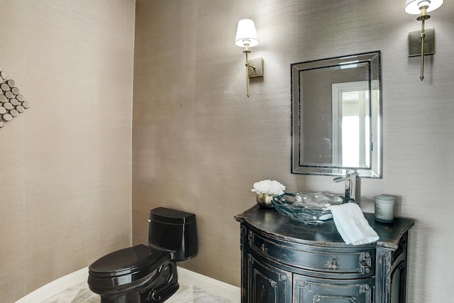 bathroom with vanity and toilet