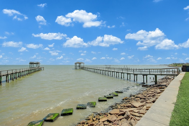 dock area featuring a water view