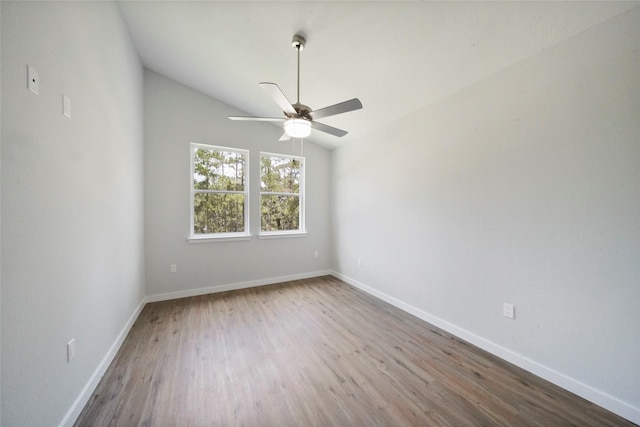 unfurnished room featuring wood finished floors, a ceiling fan, and baseboards