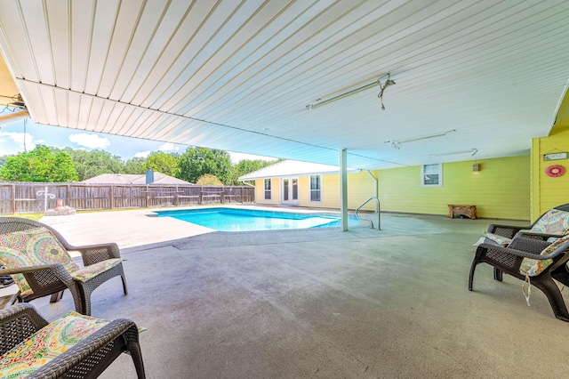 view of swimming pool featuring a patio