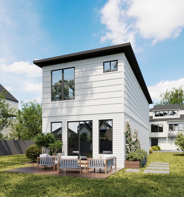 rear view of house featuring a patio and a yard