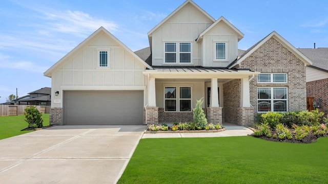 view of front of property with a standing seam roof, brick siding, board and batten siding, and a front lawn