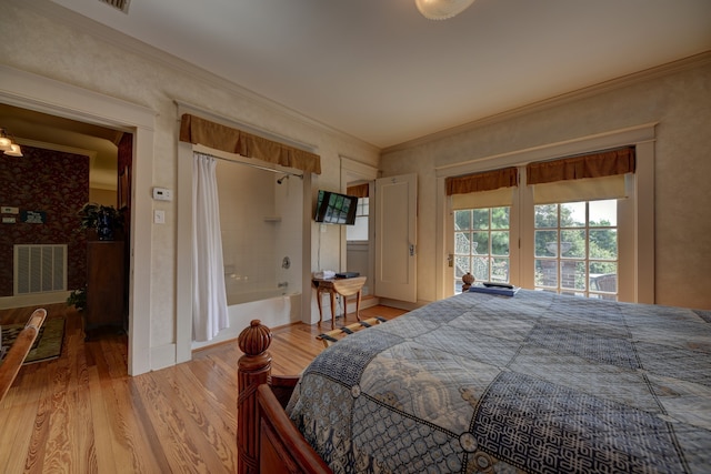 bedroom with light hardwood / wood-style floors