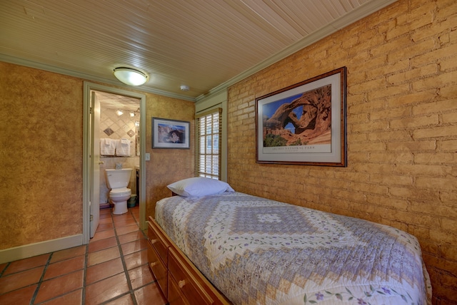 tiled bedroom featuring brick wall, ensuite bathroom, and wood ceiling