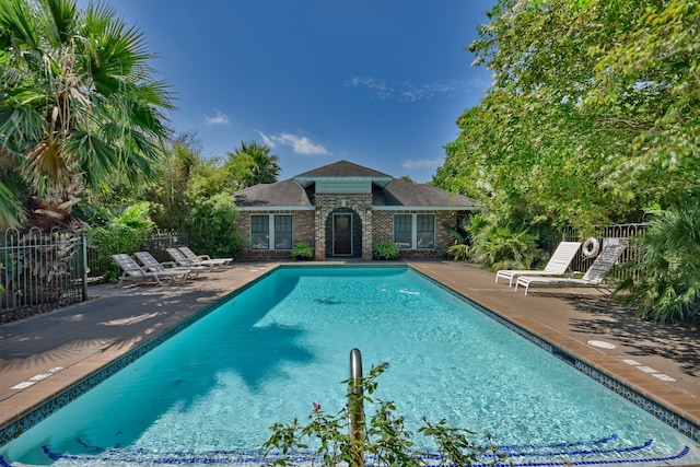 view of pool featuring a patio