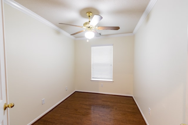 unfurnished room featuring ceiling fan, crown molding, and dark wood-type flooring