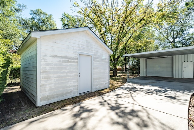 view of outbuilding featuring a garage