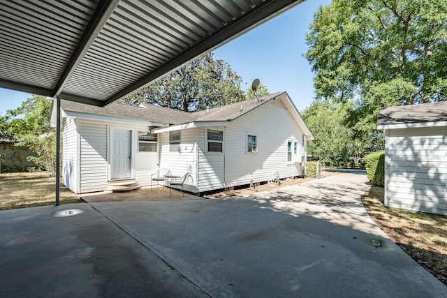 rear view of house with a patio area