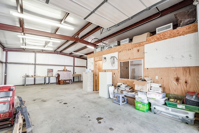 garage with wooden walls