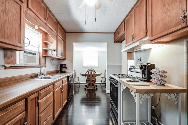 kitchen with sink, wood counters, white range with gas cooktop, crown molding, and dark hardwood / wood-style floors