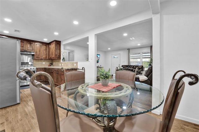 dining area featuring light hardwood / wood-style floors