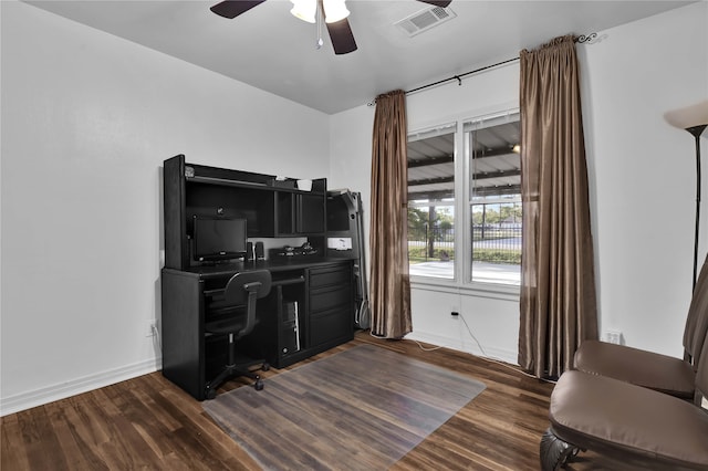 office space featuring dark hardwood / wood-style floors and ceiling fan