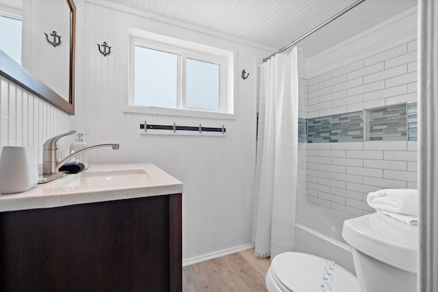 full bathroom with oversized vanity, toilet, shower / bath combo, and hardwood / wood-style flooring