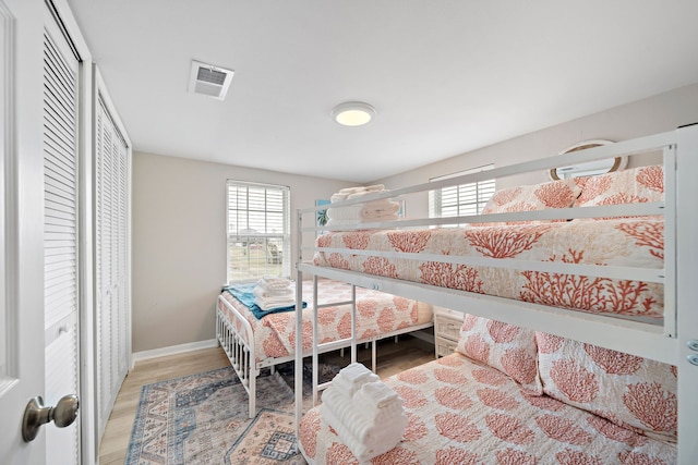 bedroom featuring light wood-type flooring