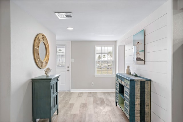 hall featuring light hardwood / wood-style floors