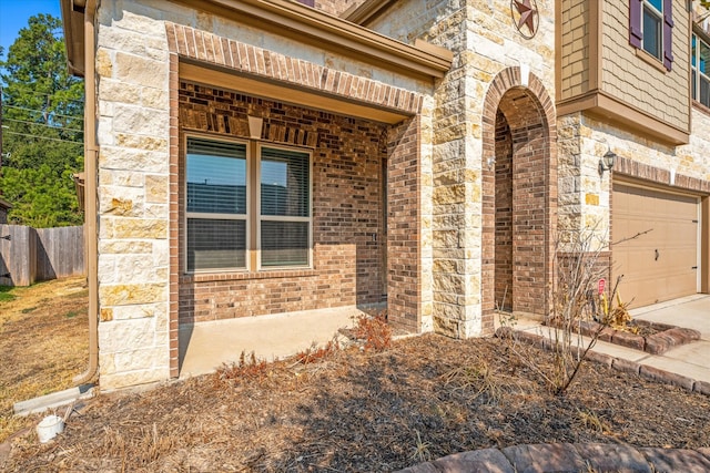 property entrance with a garage