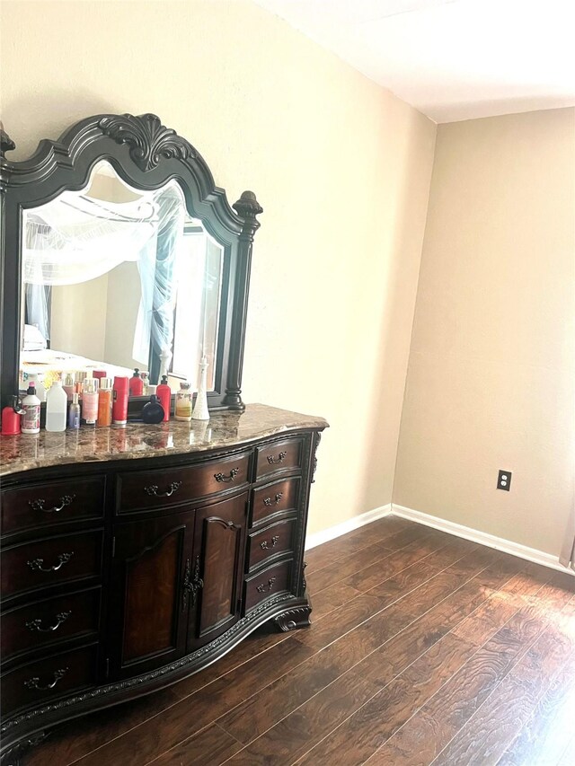 bathroom featuring vanity and hardwood / wood-style flooring