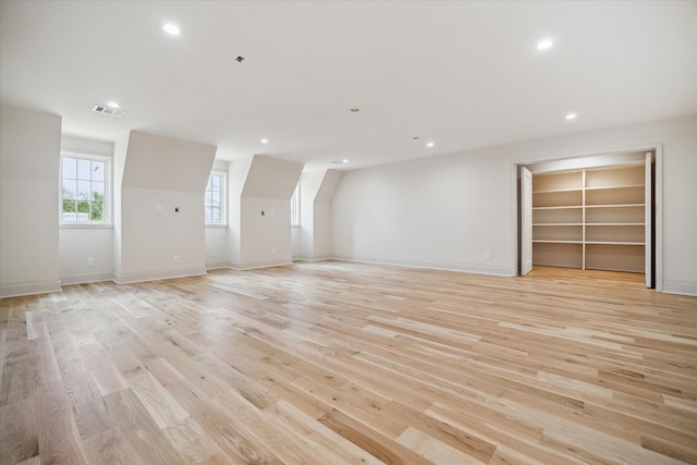 unfurnished living room with light hardwood / wood-style floors