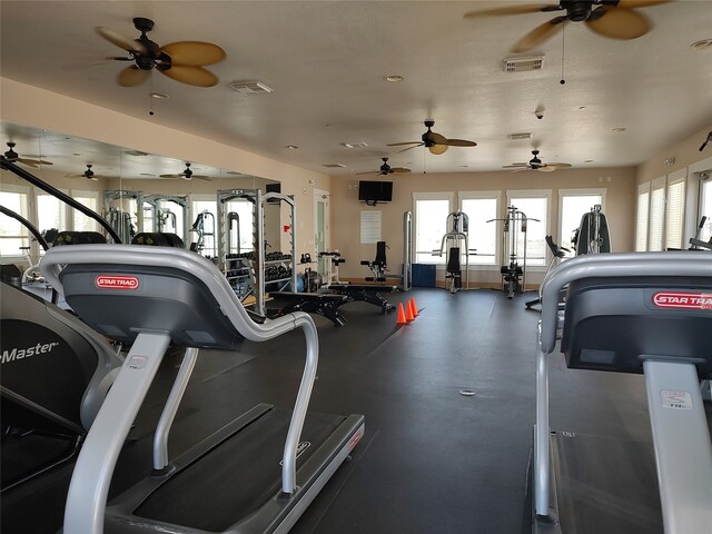 gym featuring ceiling fan