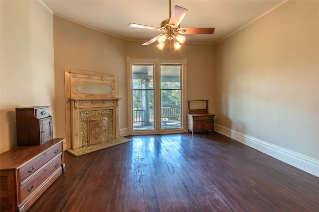 unfurnished living room with crown molding, ceiling fan, and dark hardwood / wood-style flooring