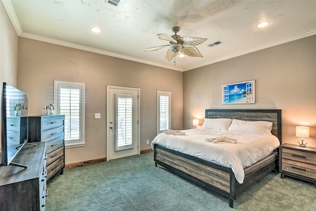 bedroom with ornamental molding, ceiling fan, and dark colored carpet