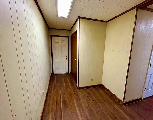 911 Dallas St, Port Neches, TX 77651 - hall with wood finished floors, crown molding, and baseboards