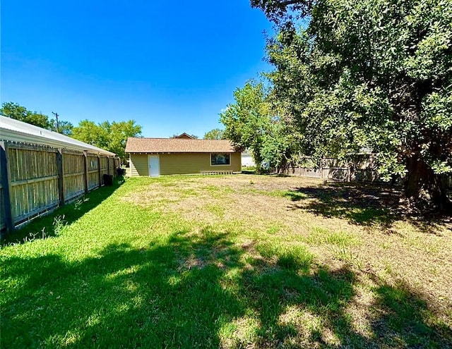 911 Dallas St, Port Neches, TX 77651 - view of yard with a fenced backyard