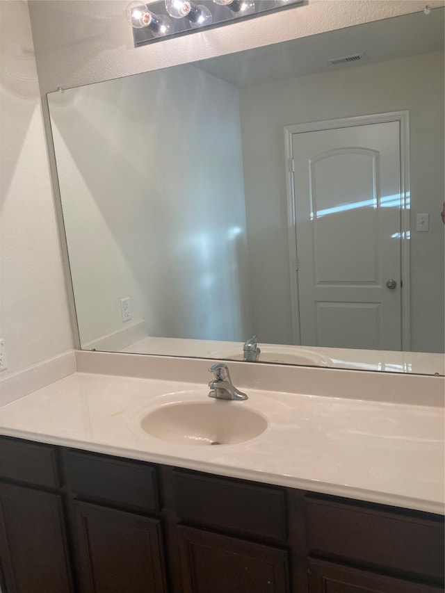 bathroom with oversized vanity