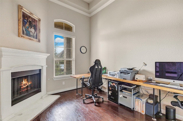 office featuring ornamental molding and dark wood-type flooring