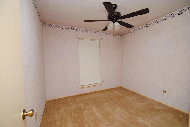 spare room featuring ceiling fan