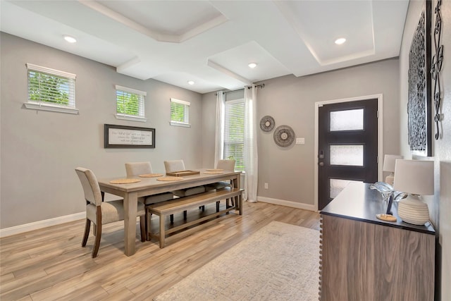 dining space featuring light wood-type flooring