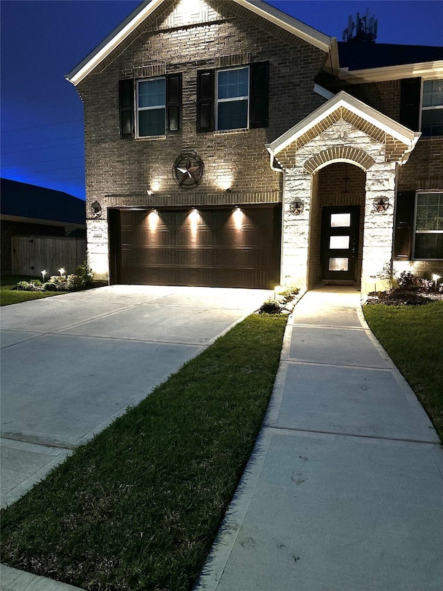 view of front of property with a garage