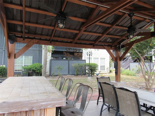 view of patio / terrace with a gazebo and ceiling fan