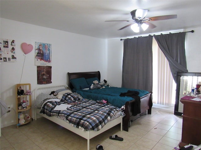 bedroom with light tile flooring and ceiling fan