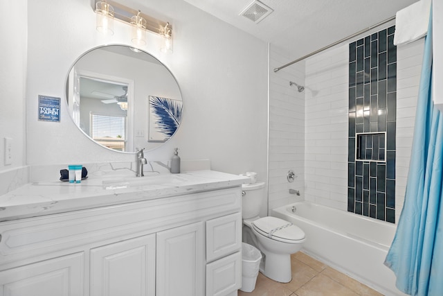 full bathroom featuring toilet, oversized vanity, ceiling fan, shower / bath combination with curtain, and tile flooring