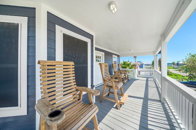 balcony featuring covered porch