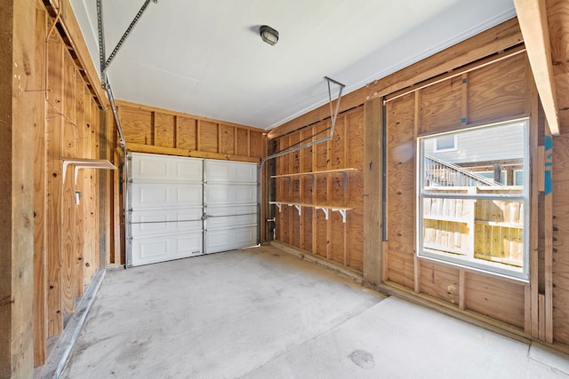 garage with wood walls