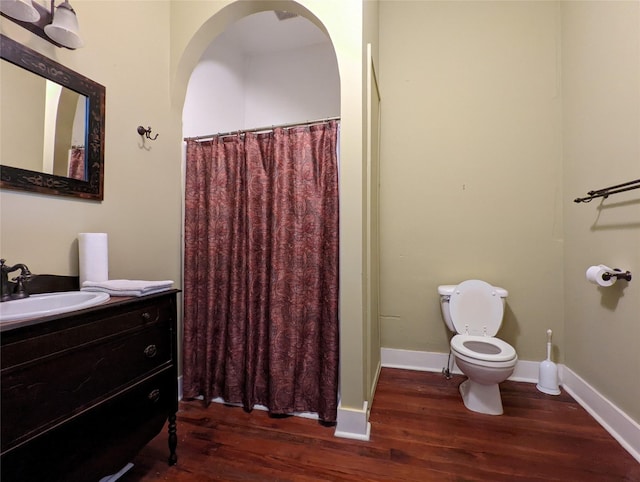 20 E Robert Toombs, Washington, GA 30673 - full bathroom with wood finished floors, vanity, and curtained shower
