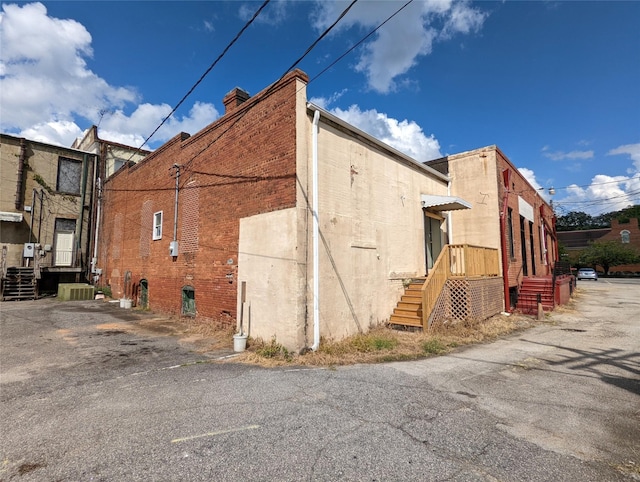 20 E Robert Toombs, Washington, GA 30673 - view of side of property featuring a cooling unit and brick siding