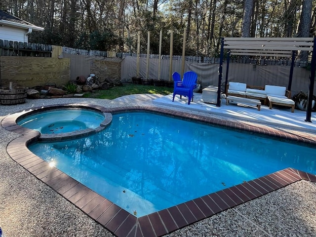 view of swimming pool featuring a patio area, an in ground hot tub, and an outdoor living space