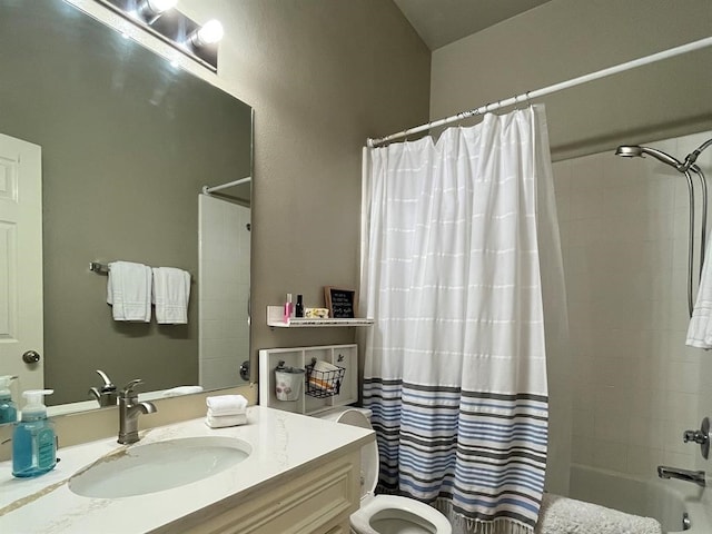 full bathroom with toilet, shower / bath combo, and vanity